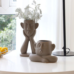 Ceramic face vase decoration