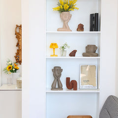 Ceramic face vase decoration