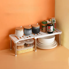 Telescopic cabinet layered shelf organizer